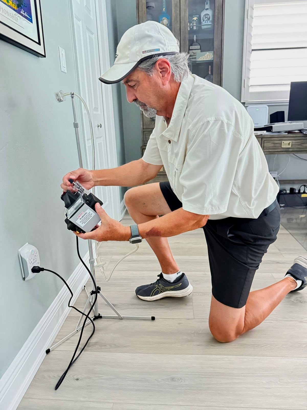 John setting up a testing monitor during an inspection